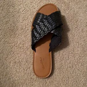 black cross sandals